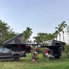 Another angle of the impressive camping rigs at our farm. With plenty of open space, it's an ideal spot for van life enthusiasts and weekend explorers.