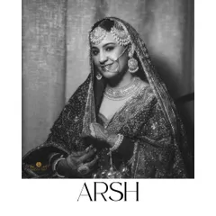 A classic, elegant black and white portrait of our Punjabi bride, Arsh. This timeless shot captures her grace and the traditional beauty of her wedding day look.