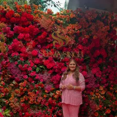 I was deeply honored to design the decor for the grand opening of the Seema Singh showroom. I created this lush floral wall in shades of red, pink, and orange to serve as a vibrant and celebratory backdrop for the special occasion.
