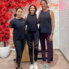 Our new studio is a home for our community. Here I am with two of our amazing members, celebrating the opening of a space dedicated to strength and joy.