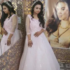 A beautiful engagement bride in a princess-style gown. I gave her a soft glam makeup look with shimmery pink eyeshadow and a matching lip, perfect for her romantic outfit.