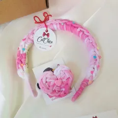 A perfect match! This is our K-Pop inspired Princess Braid headband paired with a matching heart-shaped hair tie. This combo is a huge hit and adds a fun, colorful touch to any hairstyle.