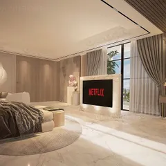 This view showcases the custom TV partition, which separates the sleeping area from the rest of the room. The design allows for an open feel while creating a cozy, dedicated space for entertainment.