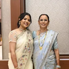 A perfect mother-in-law and daughter-in-law duo. I provided coordinated makeup for both, ensuring their looks were age-appropriate, elegant, and complemented their pastel sarees.
