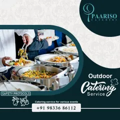 We provide complete outdoor catering services with strict adherence to safety and hygiene protocols. This image shows guests serving themselves from our well-organized buffet at an outdoor event.