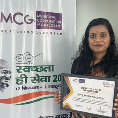Our founder, Juhi, holding our certificate from the MCG for the 'Swachhata Hi Seva' campaign. This award is a tribute to every single volunteer and community member who has joined us in our mission.