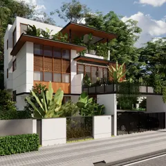 The Still House in Bengaluru is designed to settle into its landscape rather than compete with it. The architecture is defined by low horizontal lines, deep overhangs, and a restrained material palette that creates a quiet dialogue with the surrounding greenery.