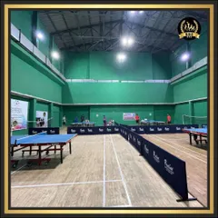 A wide shot of our multi-purpose indoor hall set up for a table tennis tournament. We can accommodate multiple matches simultaneously, making it perfect for events or group coaching.