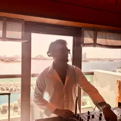In the mix with the Dubai skyline in the background. I'm experienced in handling international events and bringing my signature sound to a global audience.