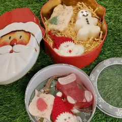My crochet Santa ornaments are a popular addition to these festive gift tins, which also include handmade soaps and other treats.