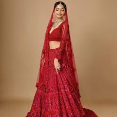 A classic red bridal look is timeless for a reason. Here, I’ve balanced the richly detailed lehenga with radiant skin and defined eyes, creating a look that is both traditional and breathtakingly beautiful for the main wedding day.