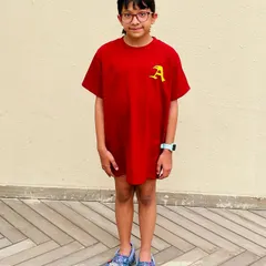 Yuvika Sharma modeling our academy's new team colors. A unified team appearance fosters a sense of identity and pride, reinforcing our shared vision of achieving excellence in and out of the pool.