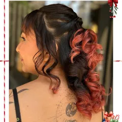 A look at how a well-placed tattoo can complement your personal style. This client's back tattoo is visible with her beautiful hairstyle, showing how body art becomes a seamless part of your look. I love helping clients express themselves through permanent art.