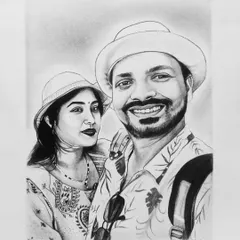 A lovely couple's portrait in black and white. I used graphite pencils to create a soft, romantic feel, perfect for capturing a special memory.