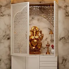 Another look at the beautiful pooja unit with jali doors, showing the ample storage drawers below for keeping prayer essentials organized.
