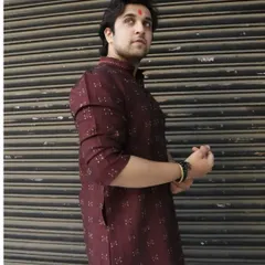 Celebrating Gudi Padwa in a traditional maroon kurta. This look is perfect for print or digital campaigns centered around Hindu new year festivities.