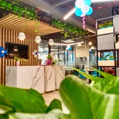 The reception area is the first point of contact for your business. For this project, I used a clean, modern design with a marble-finish desk, wood accents, and lots of indoor plants to establish a professional yet natural feel.