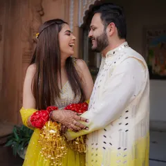 The joy of the Haldi ceremony is in the shared laughter. We capture the playful and intimate moments between the couple, like this one from Sanchit and Shriya's celebration.