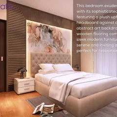 Transform your bedroom into a sanctuary. This design features a plush upholstered headboard against a stunning abstract art backdrop, with warm wooden flooring creating a serene and inviting atmosphere.