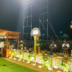Our Italian station set up under a rustic wooden pergola, creating a charming and authentic atmosphere for an evening event.