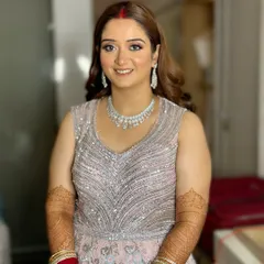 That just-married glow, with 100% love and 0% filter. This reception look features soft, romantic makeup with a hint of shimmer, perfect for a pastel gown.