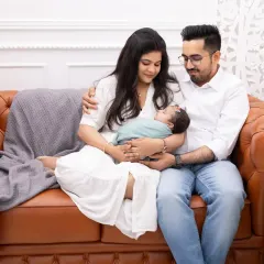 The first family portrait is a memory you will hold dear forever. We capture the pure love and connection as new parents hold their baby, creating a relaxed and intimate lifestyle session right here in our studio.