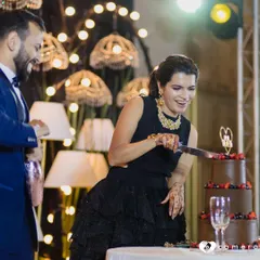 The pure joy of cutting the wedding cake. I love seeing my creations become part of such happy memories. This couple chose a three-tiered chocolate cake decorated with fresh berries.