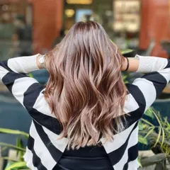 This is a perfect example of a soft, cool-toned balayage. The highlights are blended beautifully to create a multi-dimensional look that catches the light with every turn.