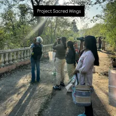It's not all hard work. We also take time to connect with nature on a deeper level. This photo captures a serene moment from one of our bird-watching walks, where we learn about our local feathered friends.