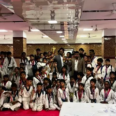 Another shot of the entire academy with our trophies after the tournament. It takes a team to achieve great things, and I am incredibly proud of every single student who participated.