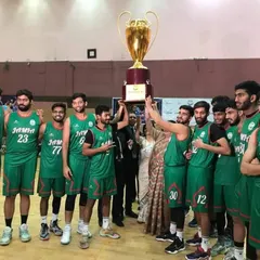 Another angle of the winning team celebrating their North Zone Inter-University Basketball title. Capturing these moments of triumph is the ultimate reward for the meticulous planning that goes into a multi-day tournament.