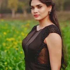 My ready-to-wear formal collection includes elegant pieces like this black evening gown. Notice the intricate beading on the cap sleeves and the sheer paneling on the bodice, details designed to create a sophisticated and glamorous silhouette for any formal event.