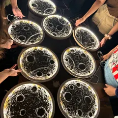 Bring the moon into your home! In my unique moon lamp workshop, you get to create this stunning, textured art piece that actually lights up. It's a fantastic hands-on activity for anyone.