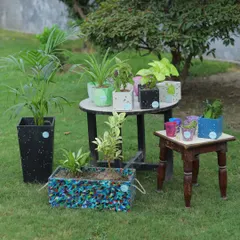 This is what sustainability looks like in your garden. Our collection of recycled plastic planters, from large statement pieces to small pots, brings unique color and character to any green space, all while keeping plastic out of landfills.