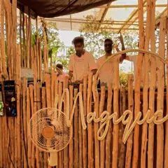 Behind the rustic DJ booth at Magique for their Holi Invasion event. The vibe was immaculate.