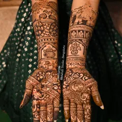 This bridal mehendi features the bride's name 'Poorna' beautifully integrated into the design, surrounded by peacocks, elephants, and a traditional kalash.
