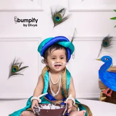 There is nothing more heartwarming than seeing a baby as little Krishna. This Janmashtami themed shoot captures the playful spirit of Kanha, complete with a pot of 'makkhan' and that mischievous, milky smile.