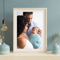 A framed portrait of your newborn session is a timeless piece of art for your home. Even if your baby is a little older, like this two-month-old, we can still create beautiful, swaddled portraits.