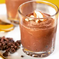 Experience my vegan chocolate mousse, a dessert that proves healthy can be incredibly decadent. It's rich, creamy, and made from a surprising ingredient: sweet potato. Topped with slivered almonds, it's a guilt-free chocolate dream.