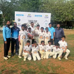 The Playsmart U12 team successfully defends their title, winning the Tiger Cup tournament for the second consecutive year. A proud moment for the players, coaches, and parents.