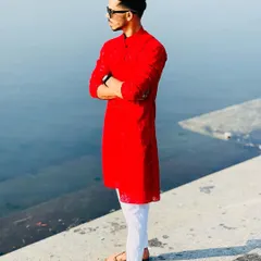 A happy client looking sharp in a custom-stitched red Chikankari kurta. This traditional Lucknowi embroidery adds so much elegance, and the fit is tailored perfectly for a modern, stylish look.