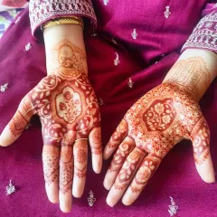 The beautiful, mature stain on a client's hands. My organic henna develops into this deep, rich color that lasts for weeks with proper care.