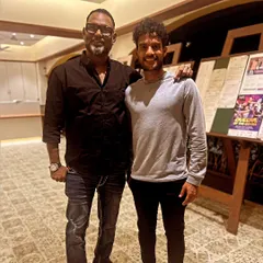 Our head coach with one of the team members. We foster a supportive environment built on mentorship and mutual respect between players and the coaching staff.