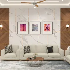 This living room features a stunning accent wall combining wood panels in a geometric pattern with a white marble finish and delicate gold inlays. The neutral sofa set allows the wall to be the hero of the space.