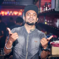Bringing the energy from behind the console. I play a mix of genres to suit any crowd, from Bollywood and commercial pop to hardstyle and techno.