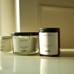 My 250g candle is perfect for larger spaces like a living room, shown here next to the 200g 'Leather' candle.
