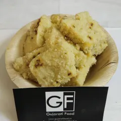 Here is my Khatta Dhokla, a tangy and savory steamed cake made from fermented rice and lentil batter. It's a healthy, gluten-free snack that is easy to digest.