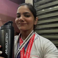 Strength, grit, and precision. Holding my medals and my trusted MuscleTech supplements after the National Masters Classic Powerlifting Championship. This is the result of discipline and smart nutrition.
