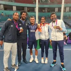 The complete team behind our Asian Games success. I am pictured with the gold and silver medal-winning players and our dedicated support staff, celebrating a successful campaign for Team India.