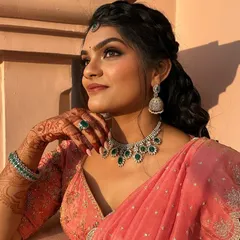 The golden hour glow perfectly complements the warm tones of this upcycled Kanchi saree lehenga. A truly magical look.